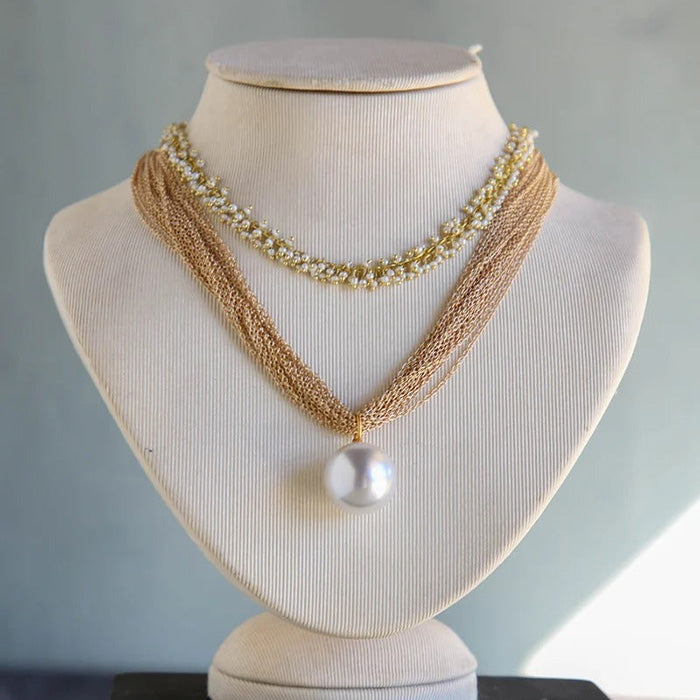 Multi Chain Pearl Pendant Necklace
